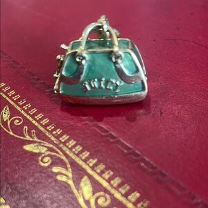 Juicy Couture Charm with dog carrier and Dog!   Still has the dog